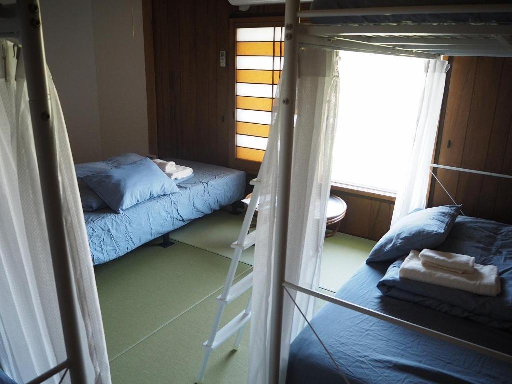 Guesthouse ＆ Beach Cafe Fuego Hyuga Room photo